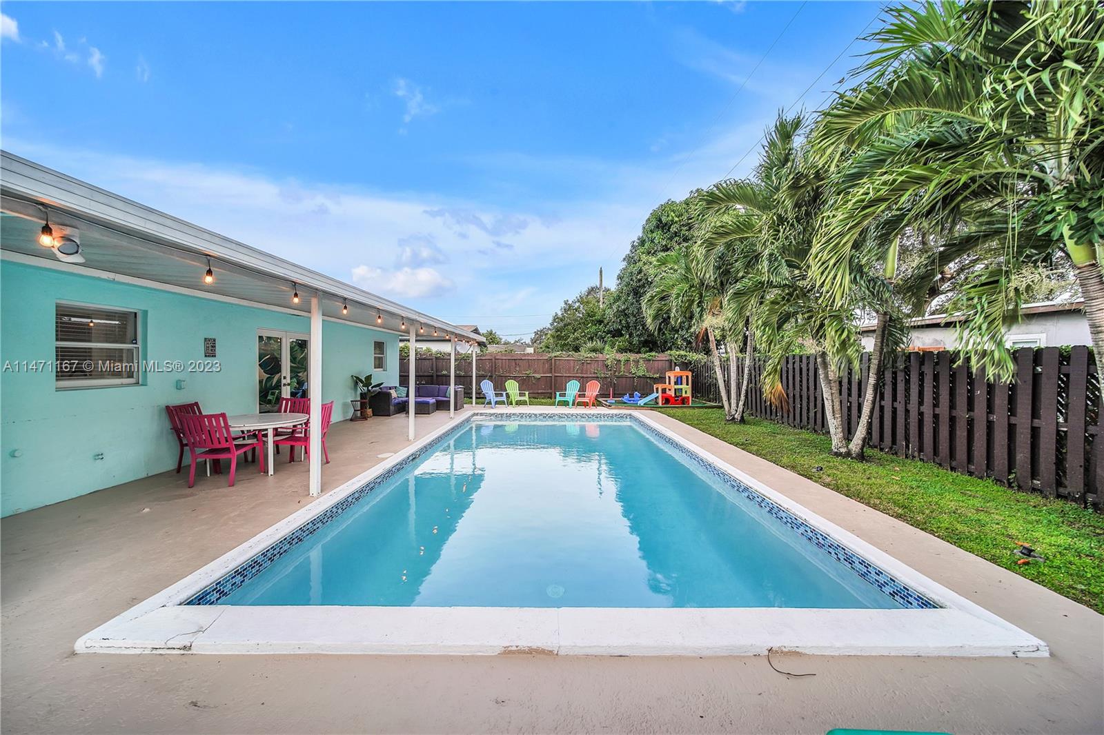 6750 Hope Street Hollywood, FL 33024 - Photo 7 of 54 a view of a swimming pool with a patio
