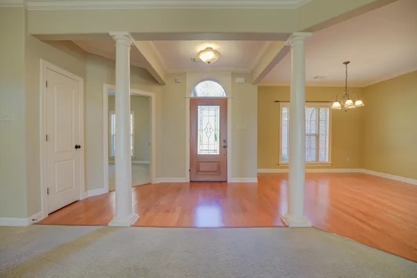 a living room with furniture fireplace and a flat screen tv