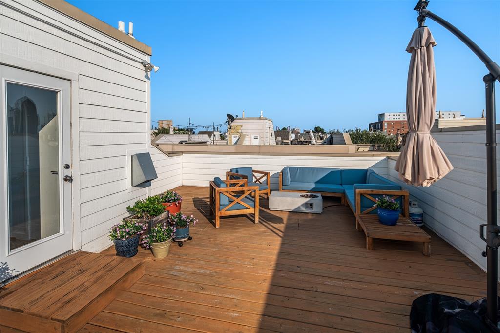 2411 North Hall Street, Unit 38 Dallas, TX 75204 - Photo 26 of 26 Wooden deck featuring an outdoor hangout area