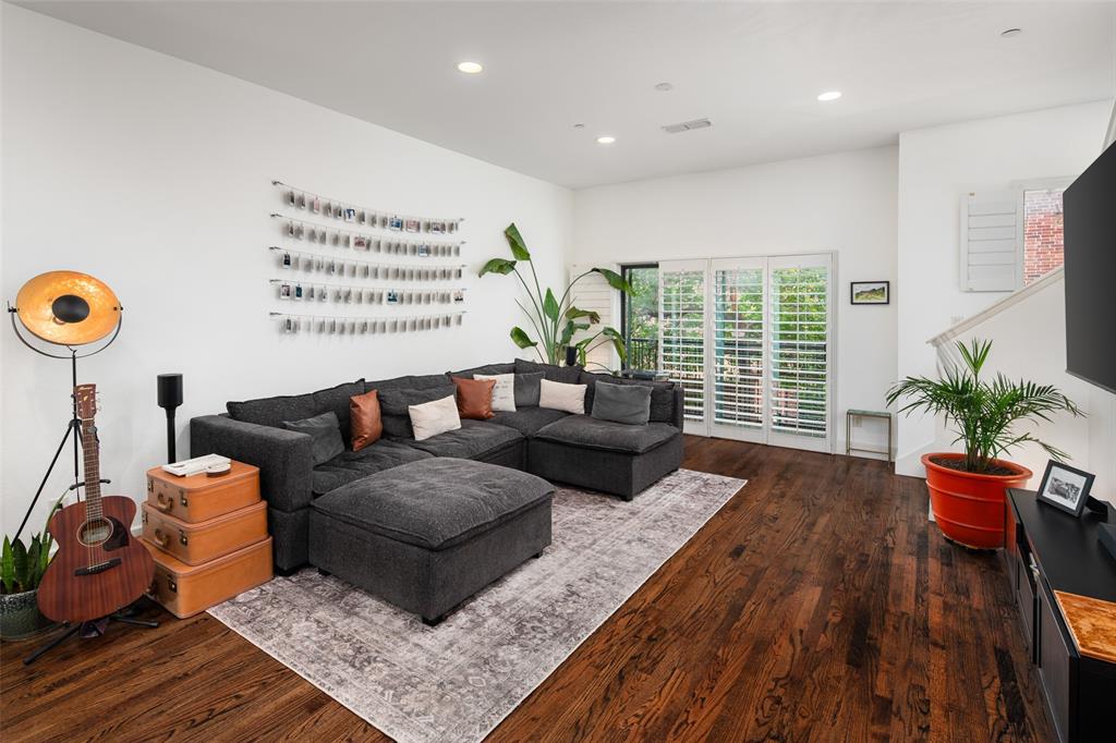 2411 North Hall Street, Unit 38 Dallas, TX 75204 - Photo 6 of 26 Living room featuring recessed lighting and dark wood-style floors