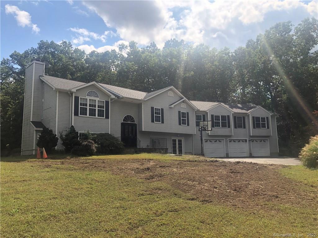 66 Rimmon Hill Road Beacon Falls, CT 06403 - Photo 1 of 1 a front view of a house with a yard
