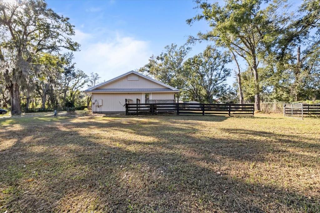 4805 Cooper Road Plant City, FL 33565 - Photo 29 of 45 a front view of a house with a yard