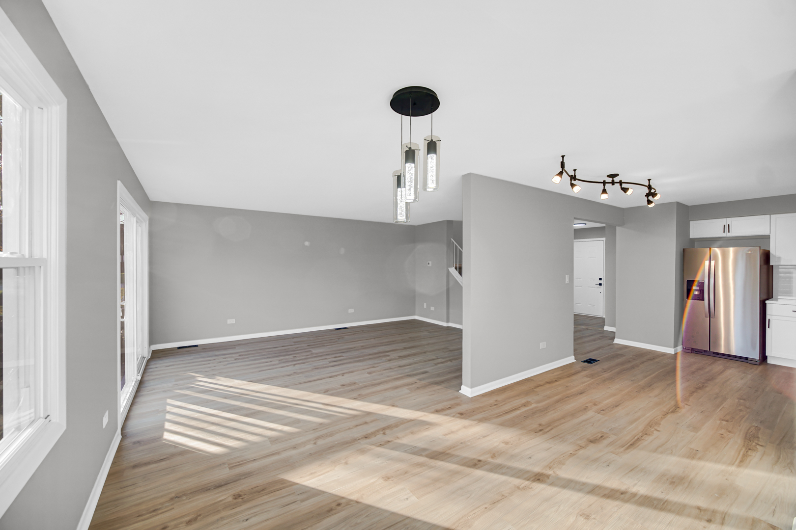 6827 Sussex Road Tinley Park, IL 60477 - Photo 9 of 27 a view of an empty room with a window