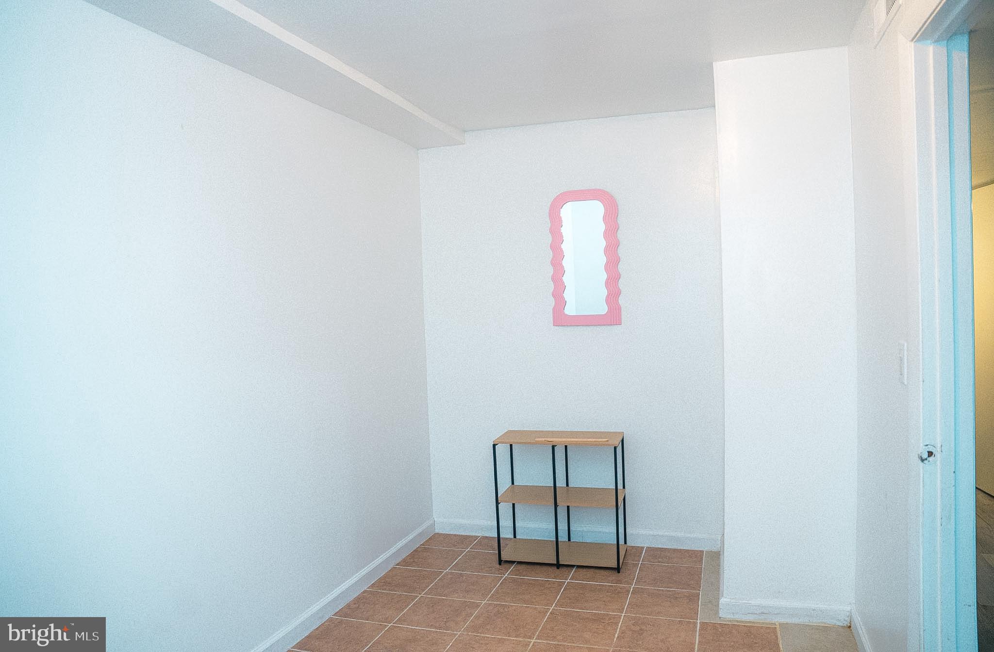 6304 Somerset Road Riverdale, MD 20737 - Photo 15 of 22 a view of an empty room