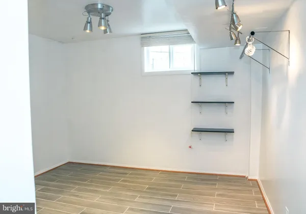 a view of an empty walk in closet