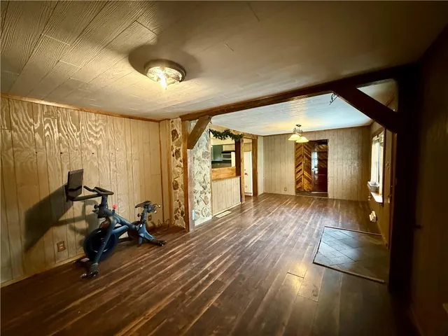 a view of gallery with wooden floor