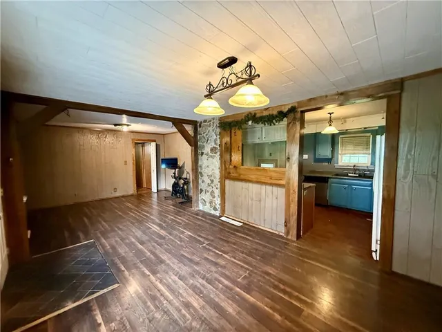 a kitchen with stainless steel appliances granite countertop a stove and a sink