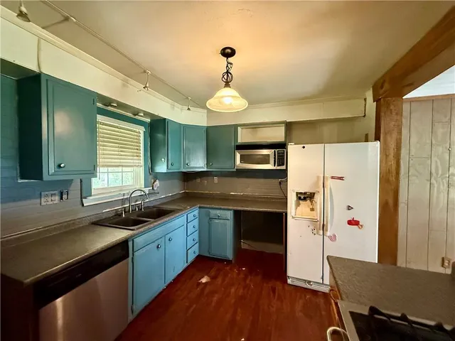 a view of wooden floor with a window