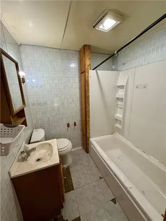 a view of a chairs and table in the patio