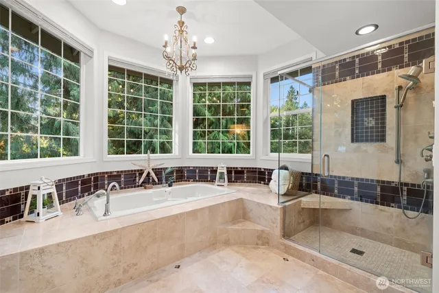 a view of a roof deck with table and chairs and wooden floor
