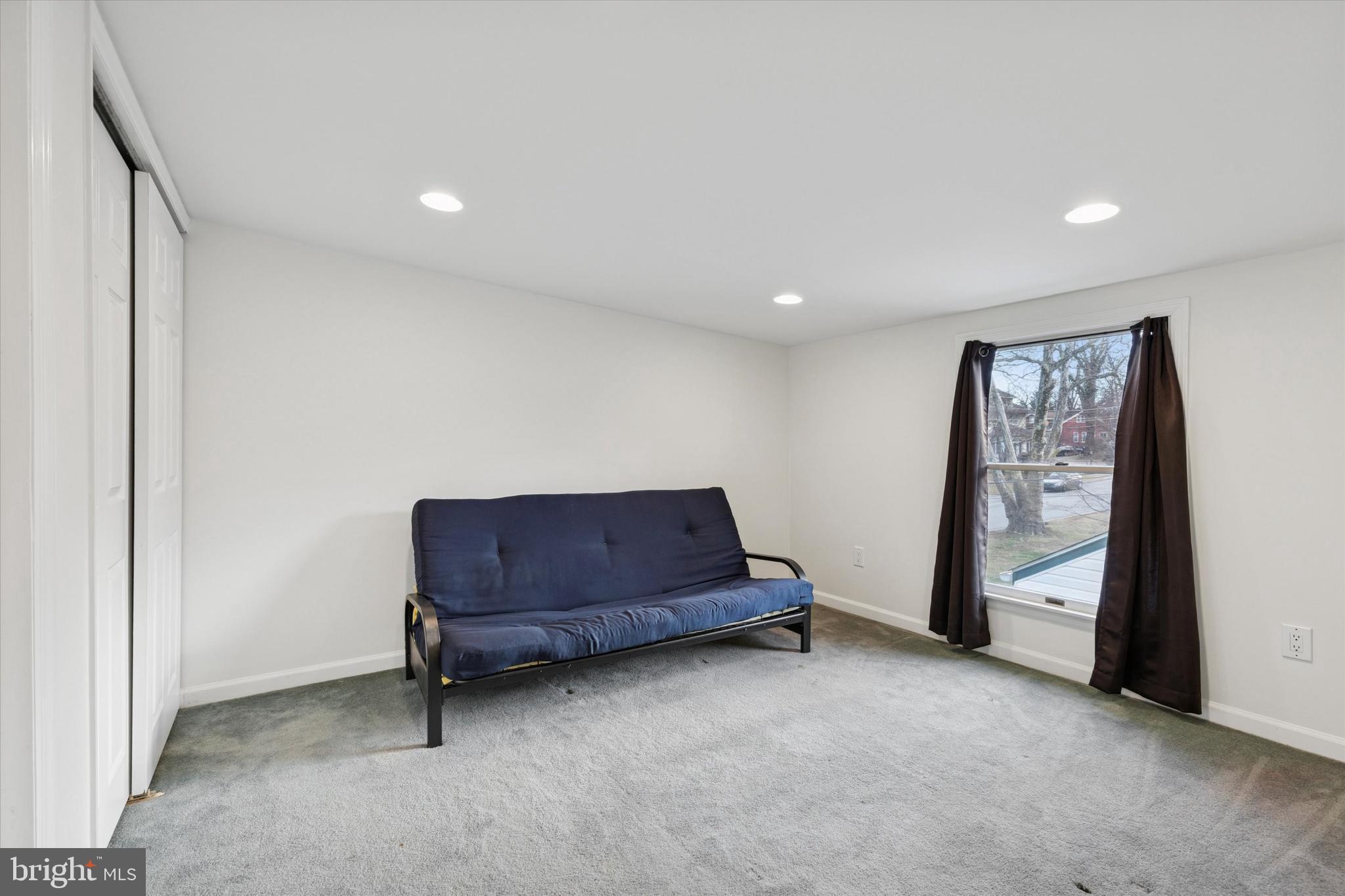 2718 Hawthorne Road Glenside, PA 19038 - Photo 16 of 23 a room with furniture and a window