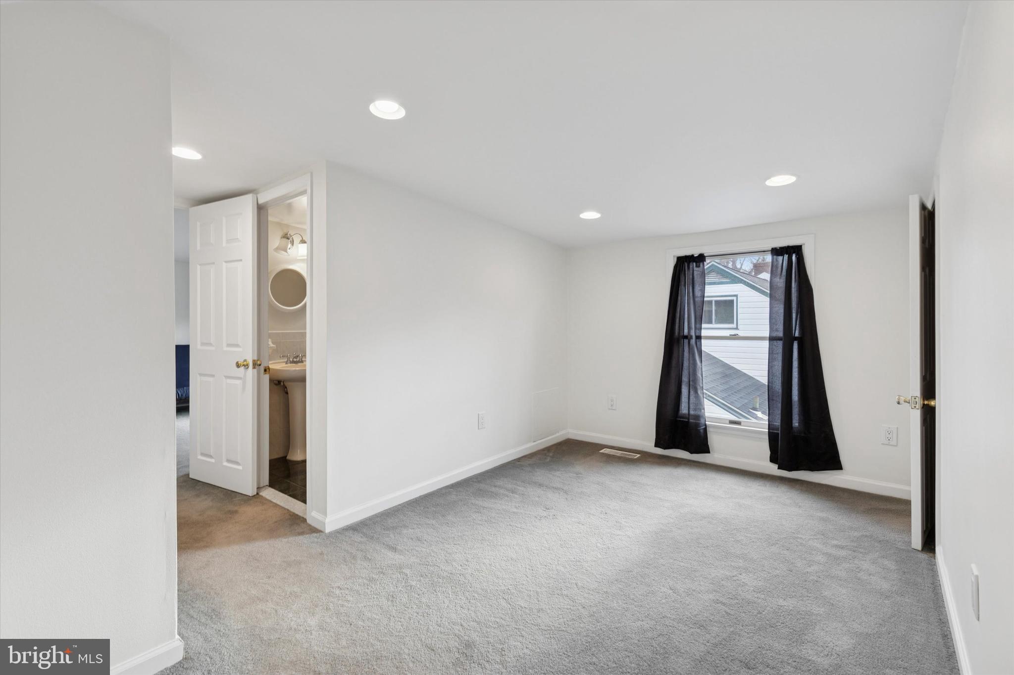 2718 Hawthorne Road Glenside, PA 19038 - Photo 17 of 23 a view of an empty room and a window