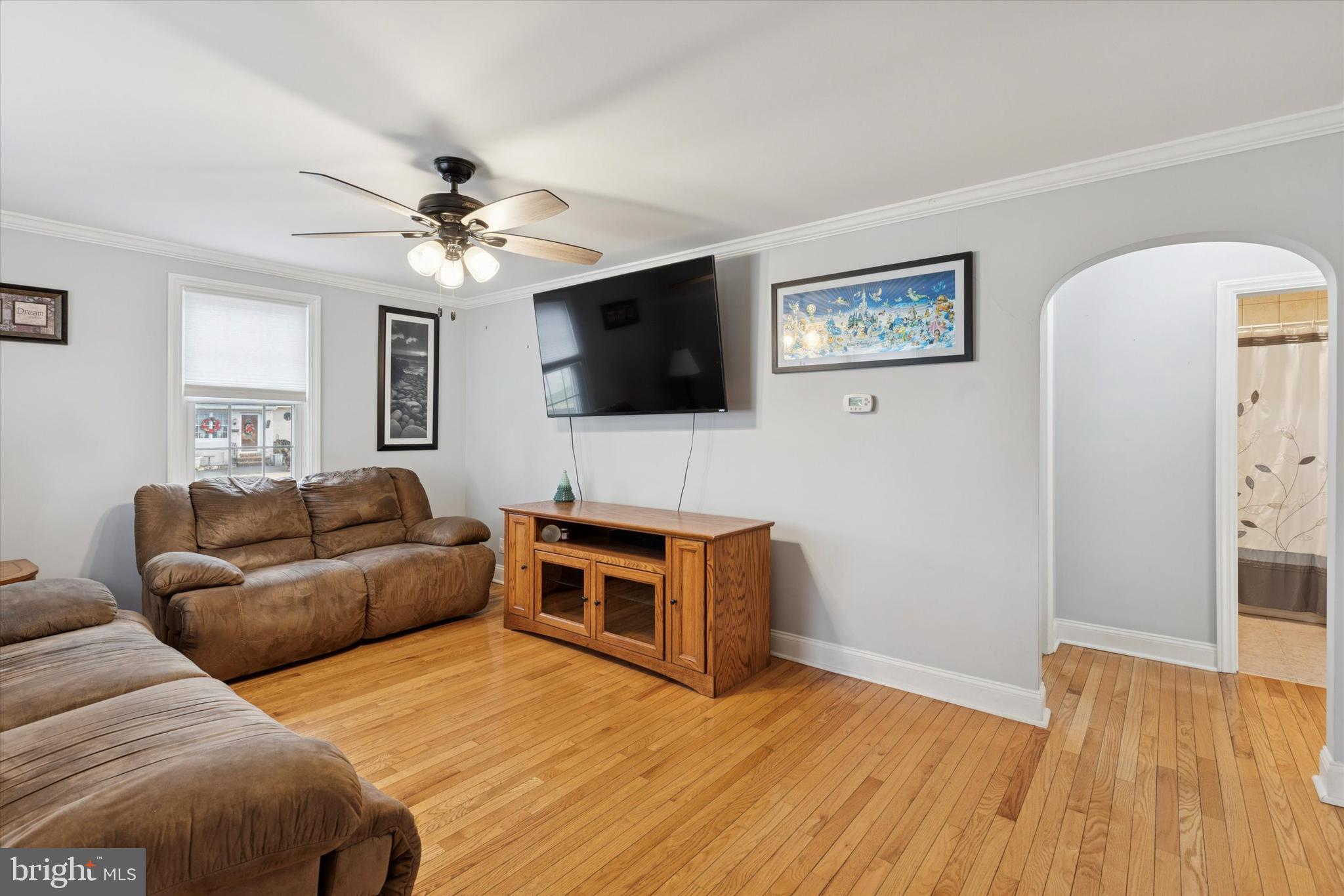 2718 Hawthorne Road Glenside, PA 19038 - Photo 5 of 23 a living room with furniture and a flat screen tv