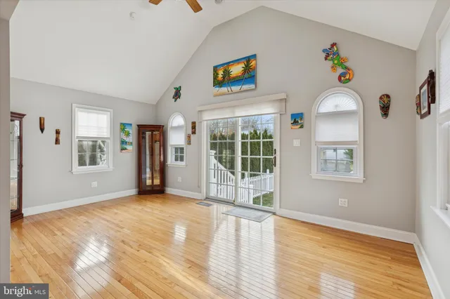 a view of an entryway with wooden floor