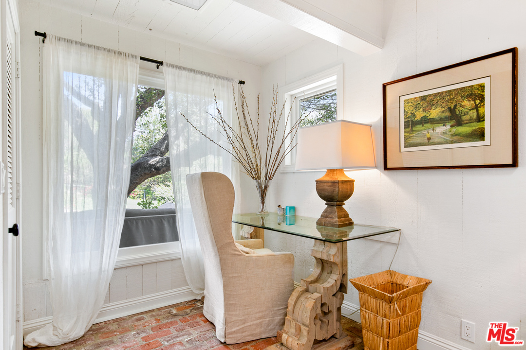 6133 Ramirez Canyon Road Malibu, CA 90265 - Photo 17 of 53 a view of living room with furniture and floor to ceiling window