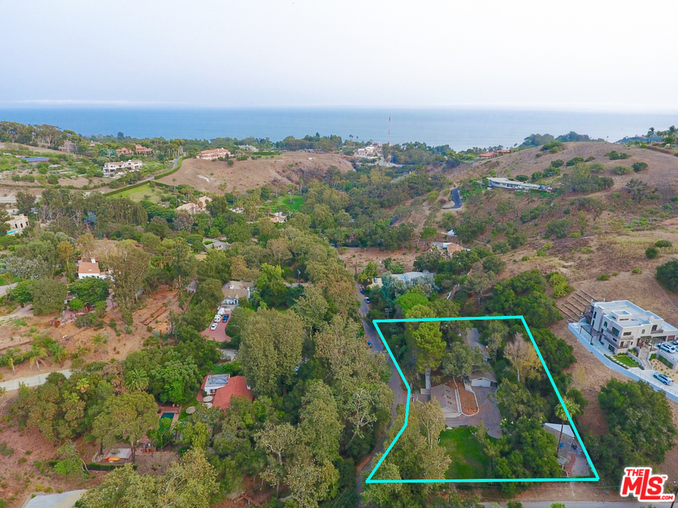 6133 Ramirez Canyon Road Malibu, CA 90265 - Photo 51 of 53 an aerial view of a house with a yard