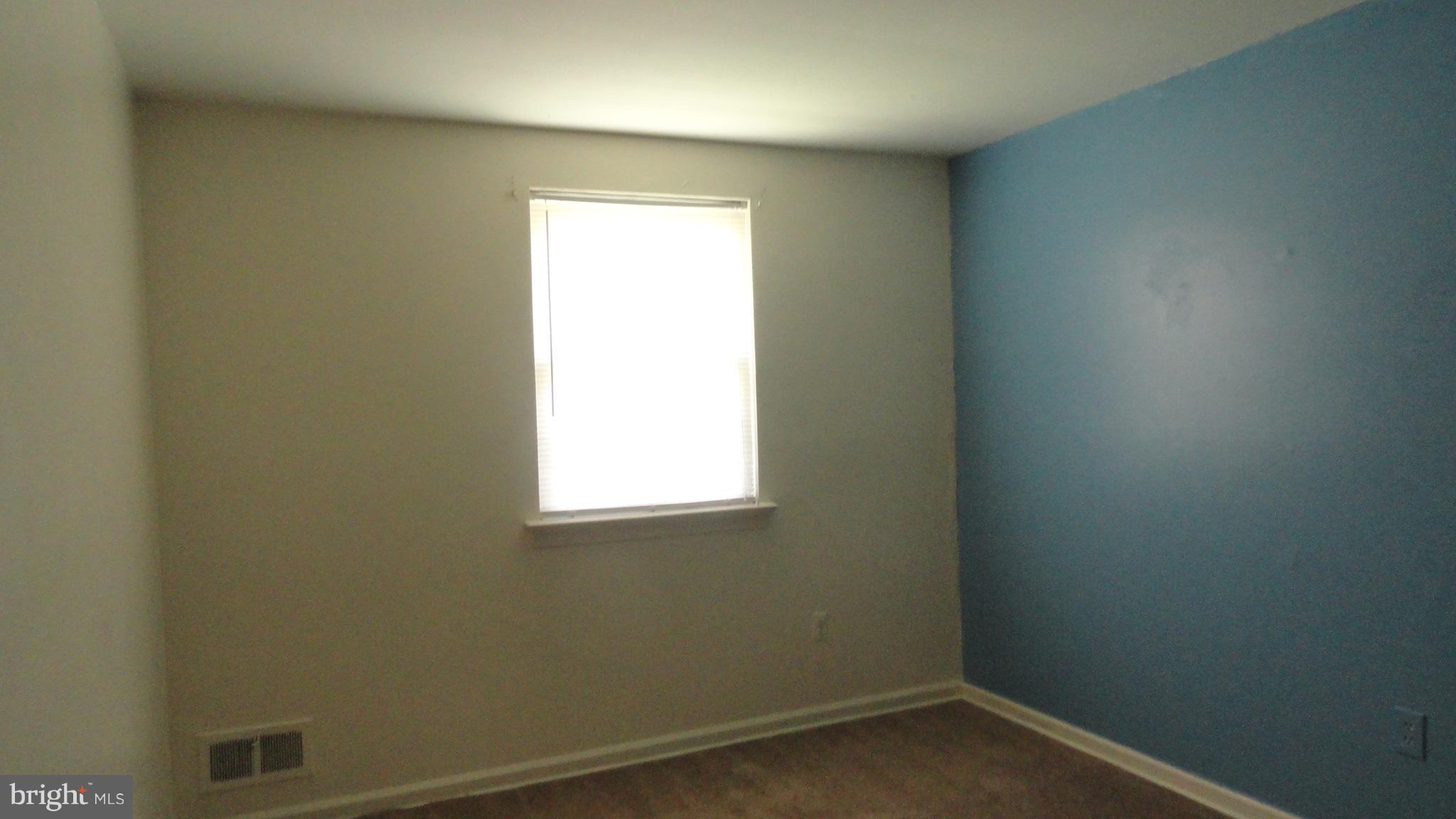 1911 Addison Road South District Heights, MD 20747 - Photo 5 of 15 a small space with a window