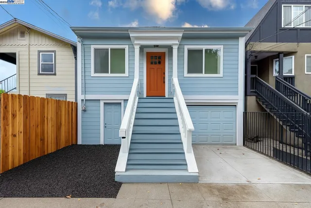 a view of a house with wooden stairs