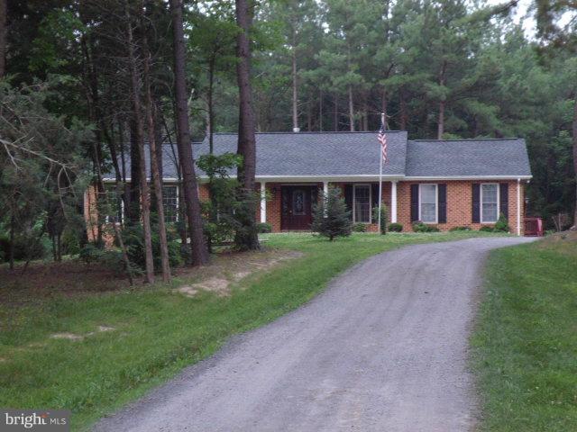 20140 Fort Valley Road Strasburg, VA 22657 - Photo 18 of 25 a front view of a house with a garden