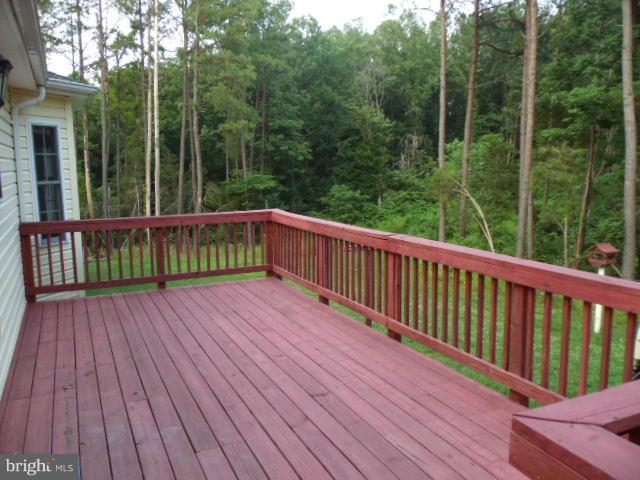 20140 Fort Valley Road Strasburg, VA 22657 - Photo 3 of 25 a view of balcony with wooden floor and fence