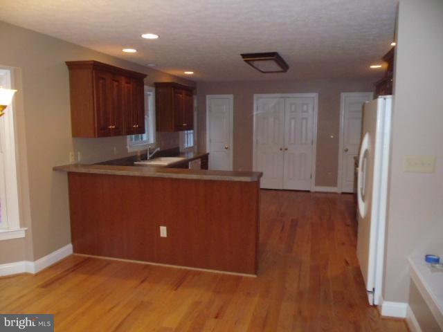 20140 Fort Valley Road Strasburg, VA 22657 - Photo 9 of 25 a view of kitchen with wooden floor
