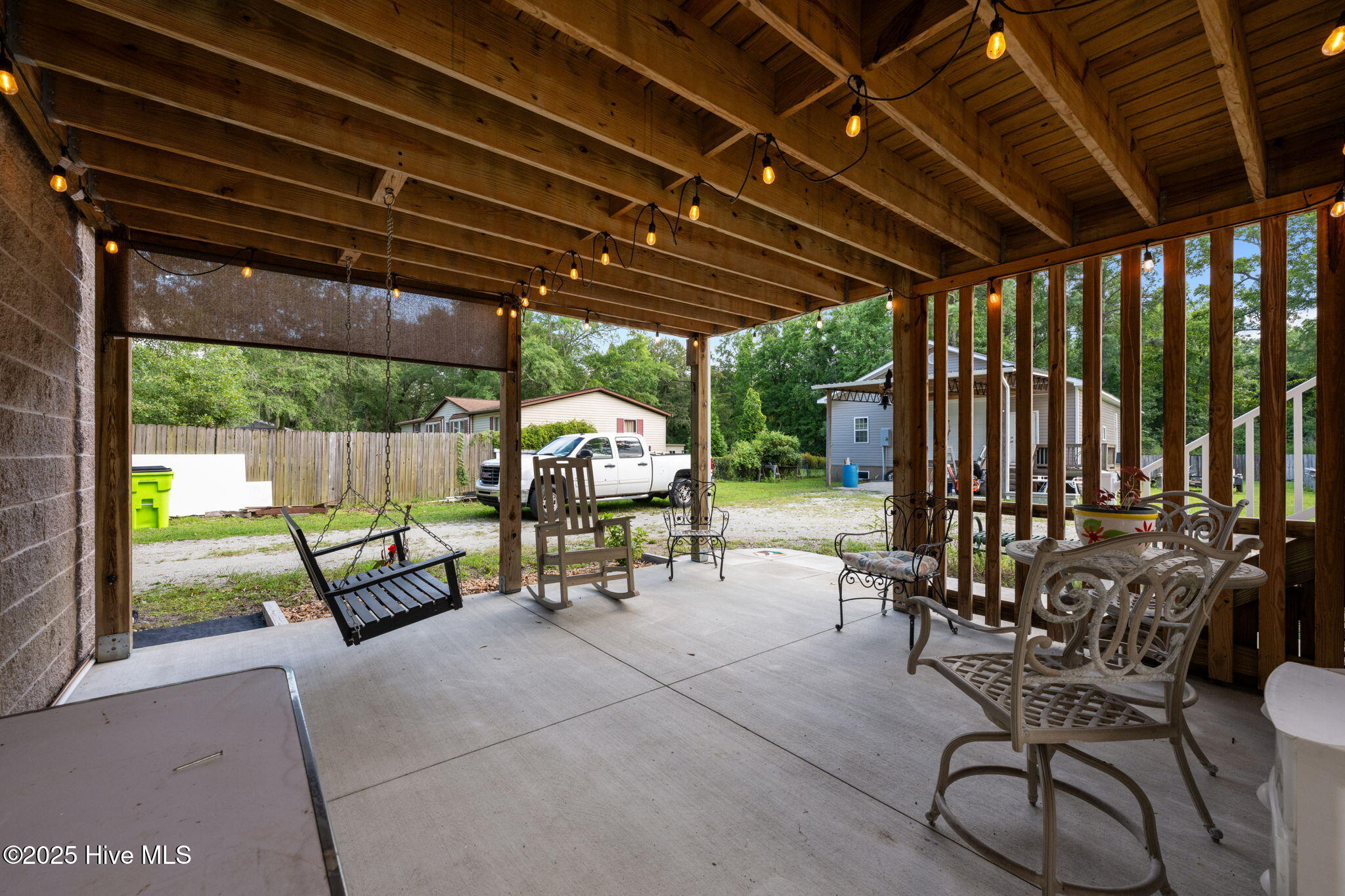 425 Sand Ridge Road New Bern, NC 28560 - Photo 35 of 53 Backyard Patio Overlooking Lawn