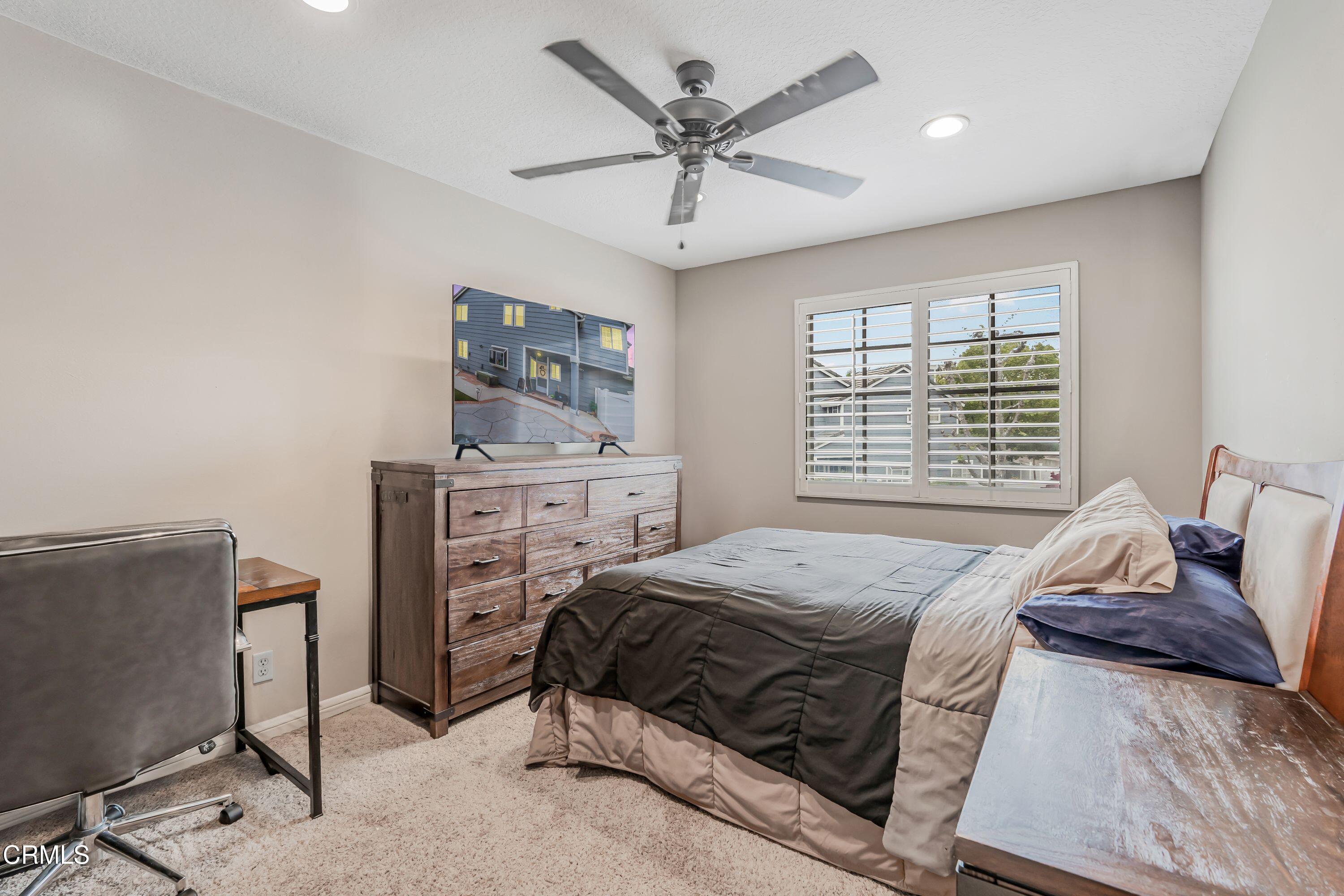 2752 Lemon Drive Simi Valley, CA 93063 - Photo 19 of 31 a bedroom with a bed and a window