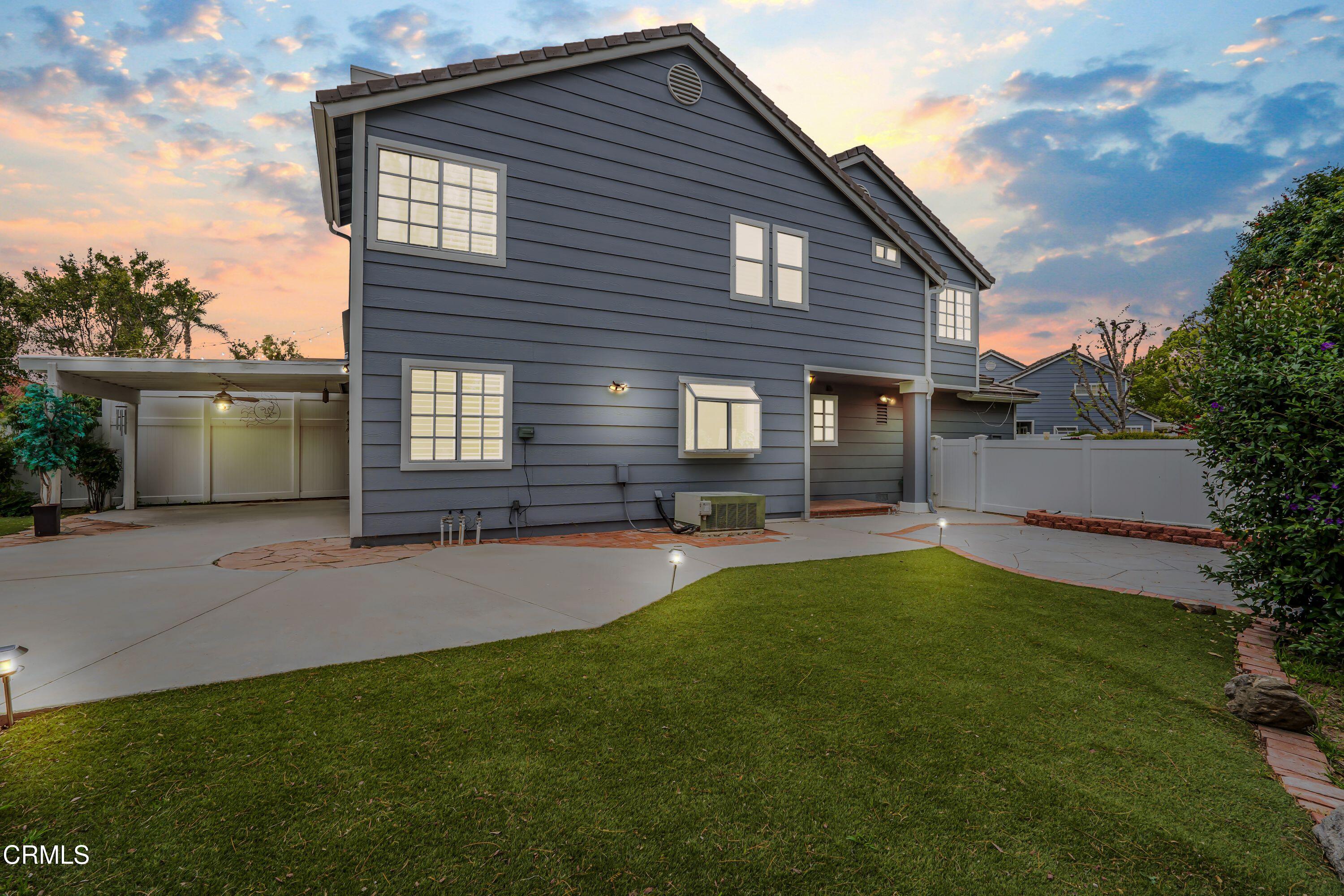 2752 Lemon Drive Simi Valley, CA 93063 - Photo 22 of 31 a backyard of a house with table and chairs
