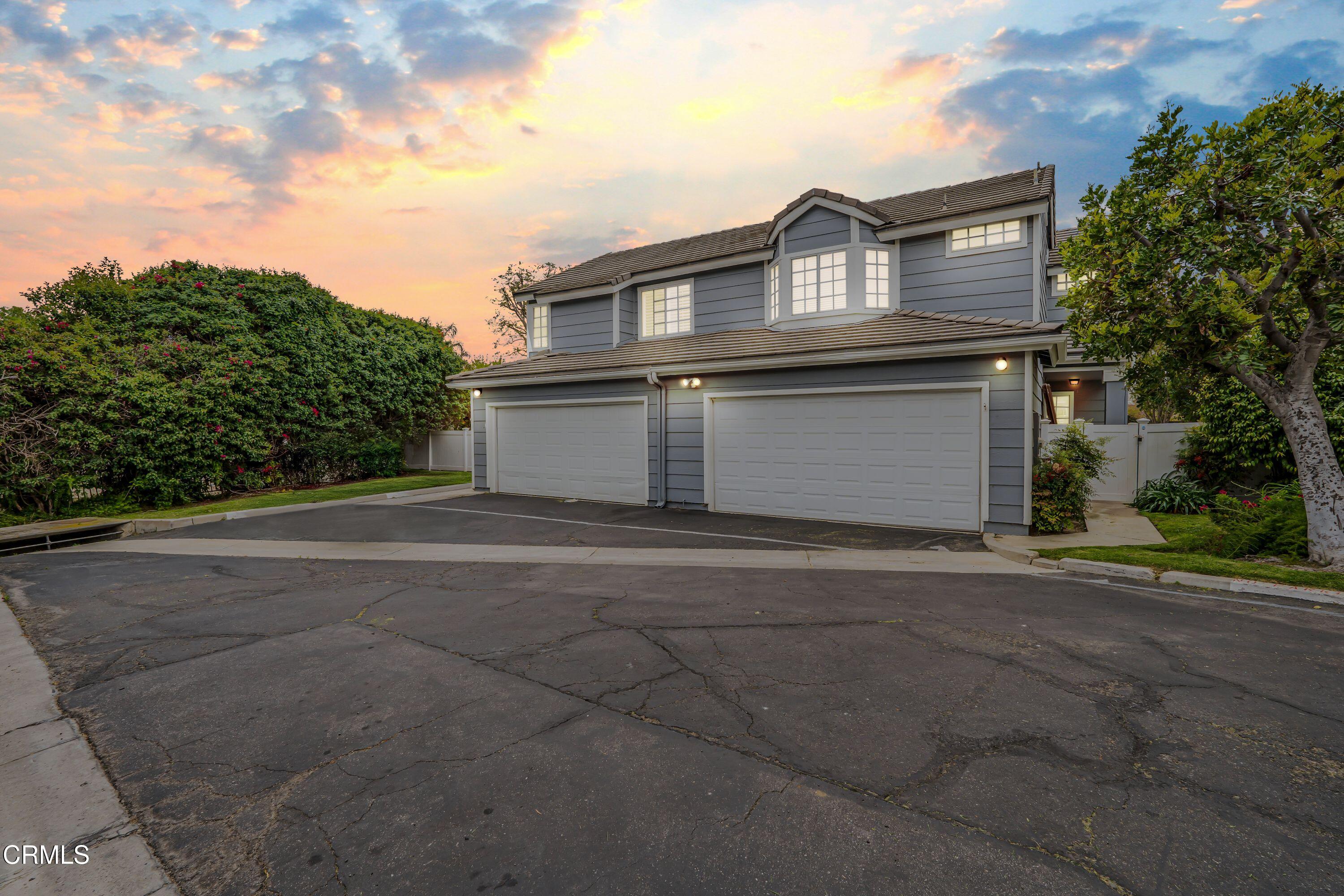 2752 Lemon Drive Simi Valley, CA 93063 - Photo 31 of 31 a front view of a house with a yard and garage