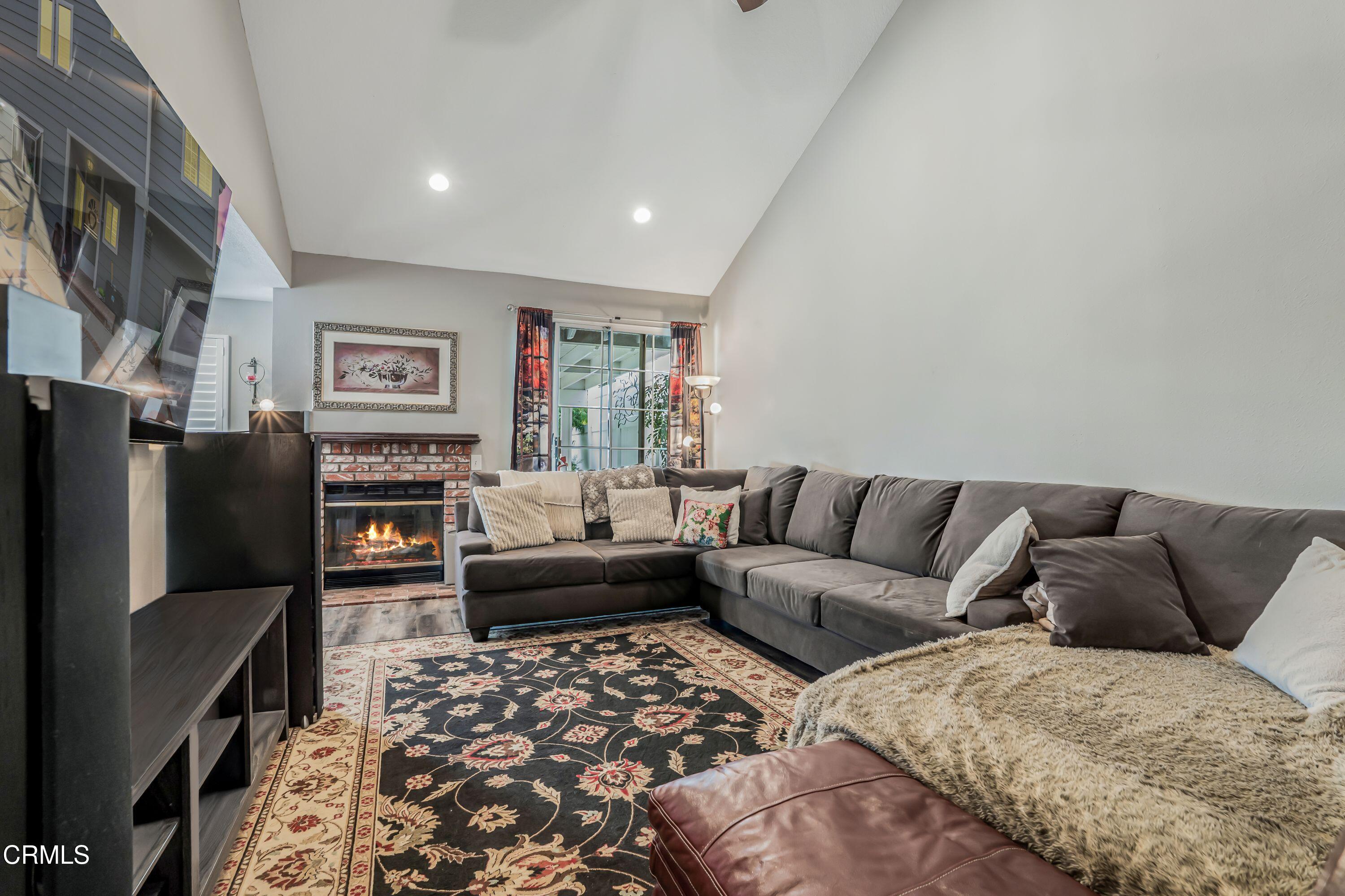 2752 Lemon Drive Simi Valley, CA 93063 - Photo 4 of 31 a living room with furniture a couch and a flat screen tv