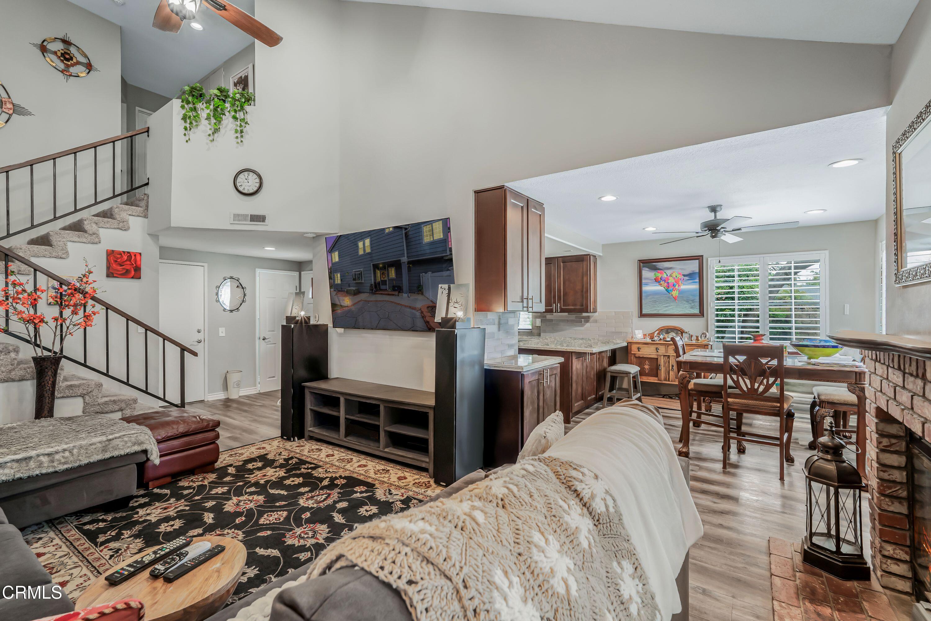 2752 Lemon Drive Simi Valley, CA 93063 - Photo 6 of 31 a living room with furniture kitchen view and a wooden floor