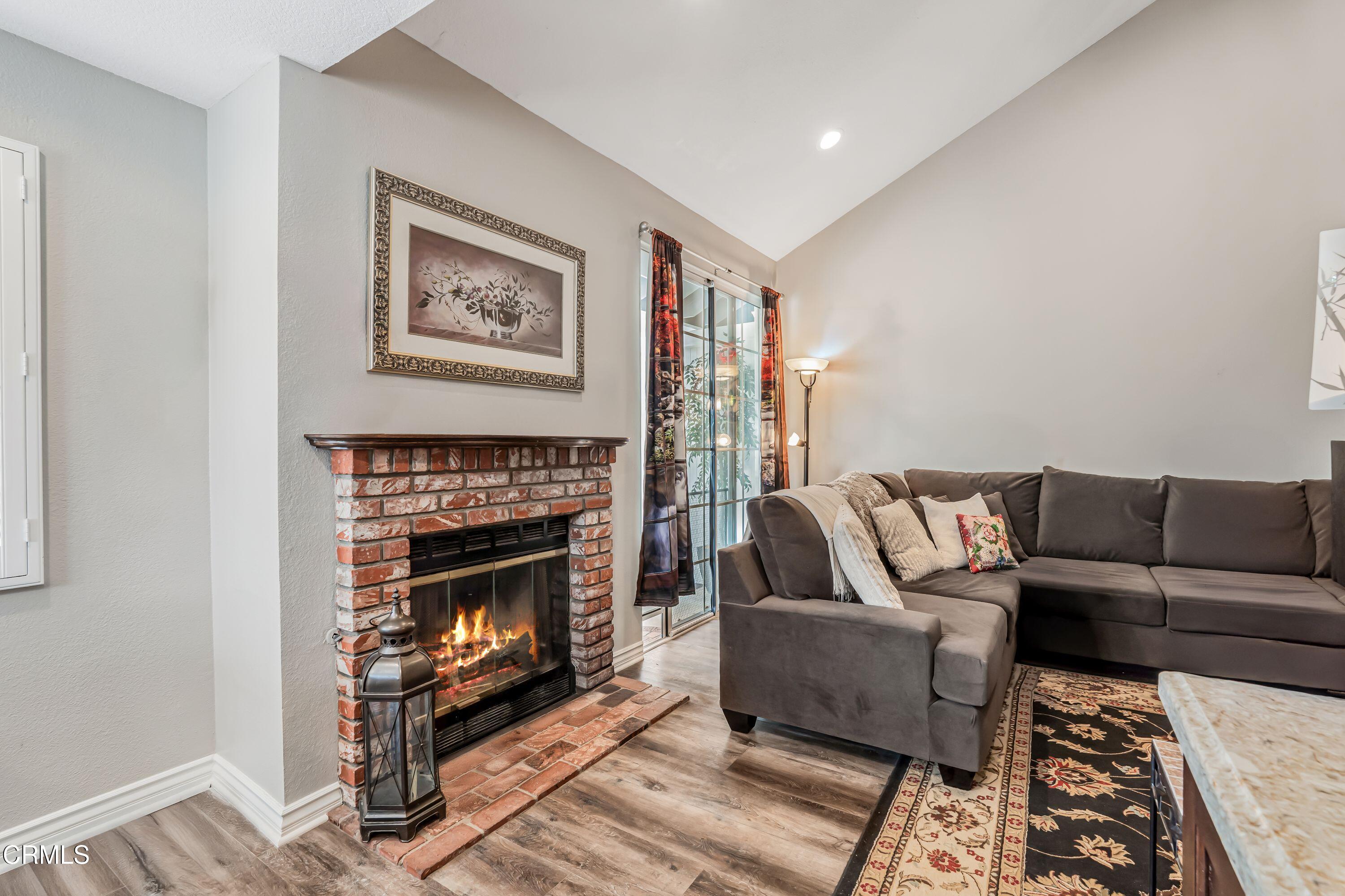 2752 Lemon Drive Simi Valley, CA 93063 - Photo 7 of 31 a living room with furniture and a fireplace
