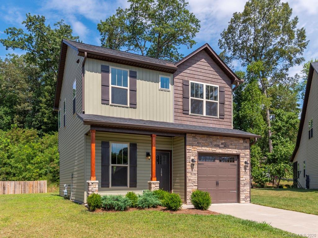 189 North River Road Fletcher, NC 28732 - Photo 1 of 27 a front view of a house with garden