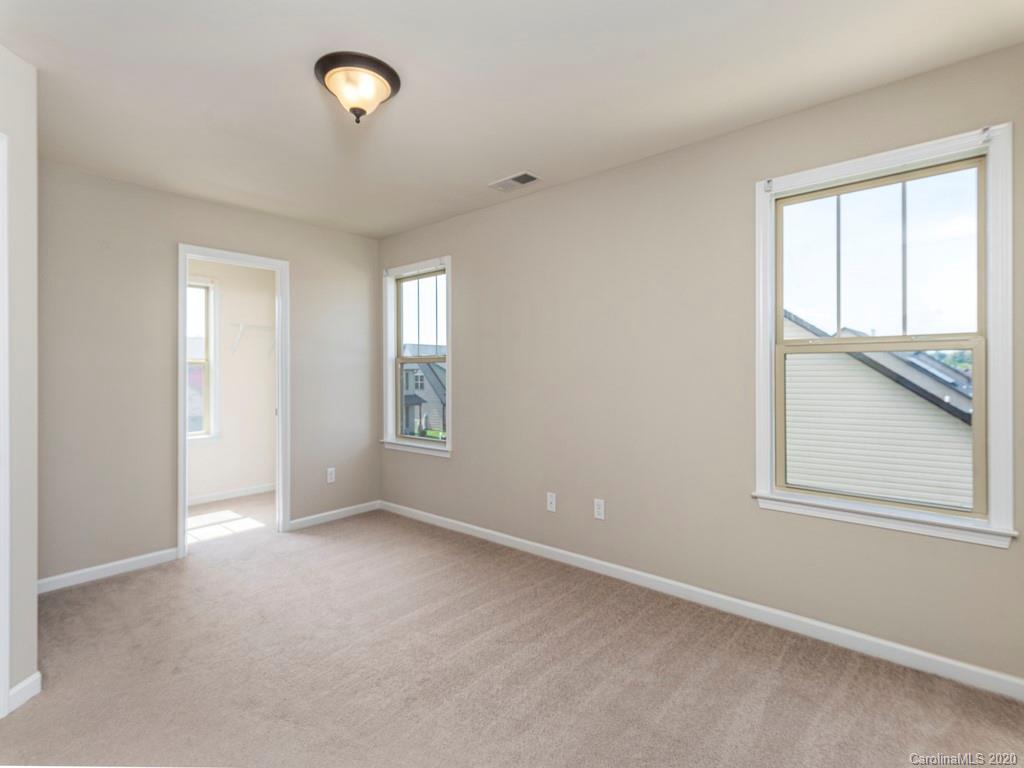189 North River Road Fletcher, NC 28732 - Photo 12 of 27 an empty room with windows