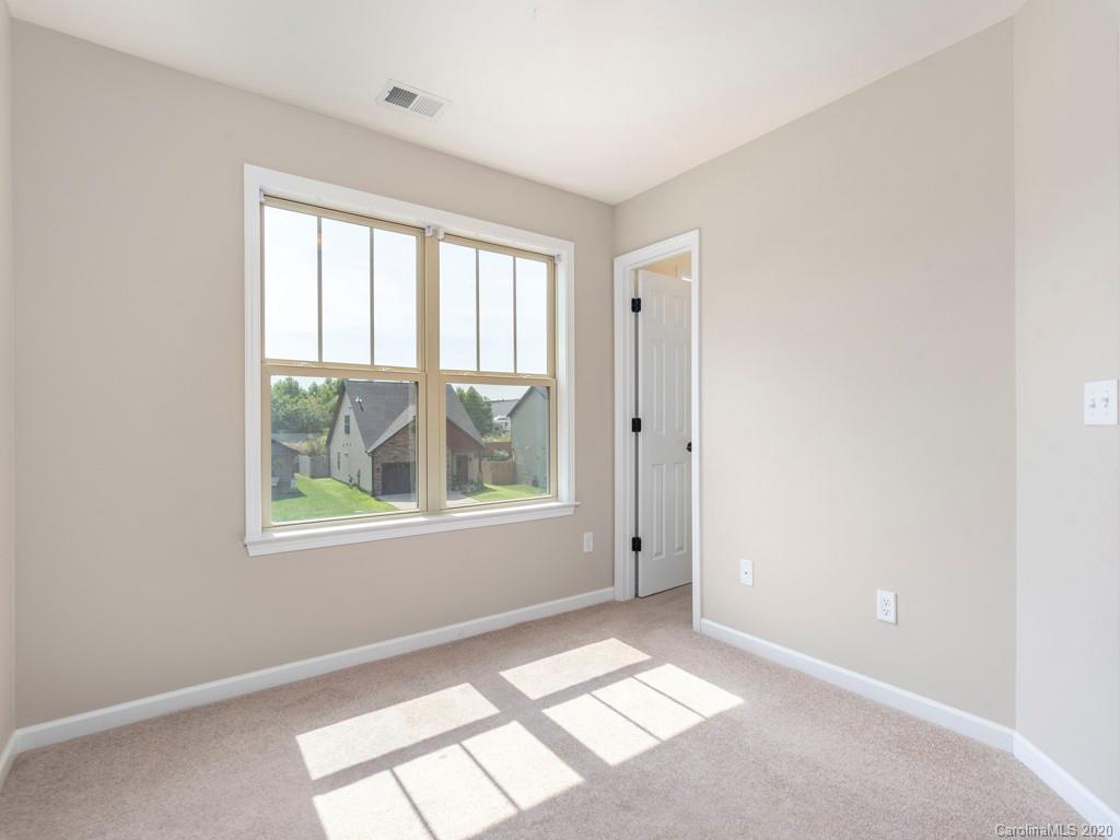 189 North River Road Fletcher, NC 28732 - Photo 17 of 27 an empty room with windows