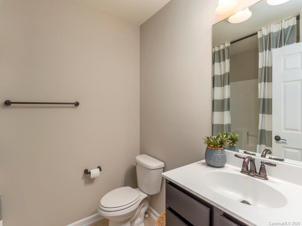189 North River Road Fletcher, NC 28732 - Photo 18 of 27 a bathroom with a sink toilet and a mirror