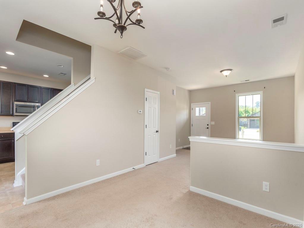 189 North River Road Fletcher, NC 28732 - Photo 8 of 27 a view of an empty room with a window
