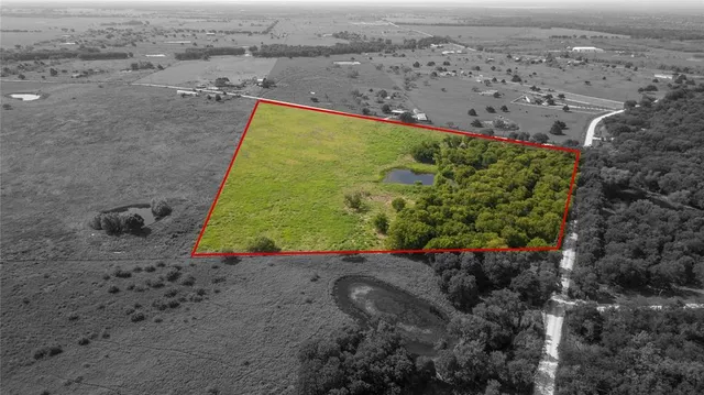 a view of a lake with a city view