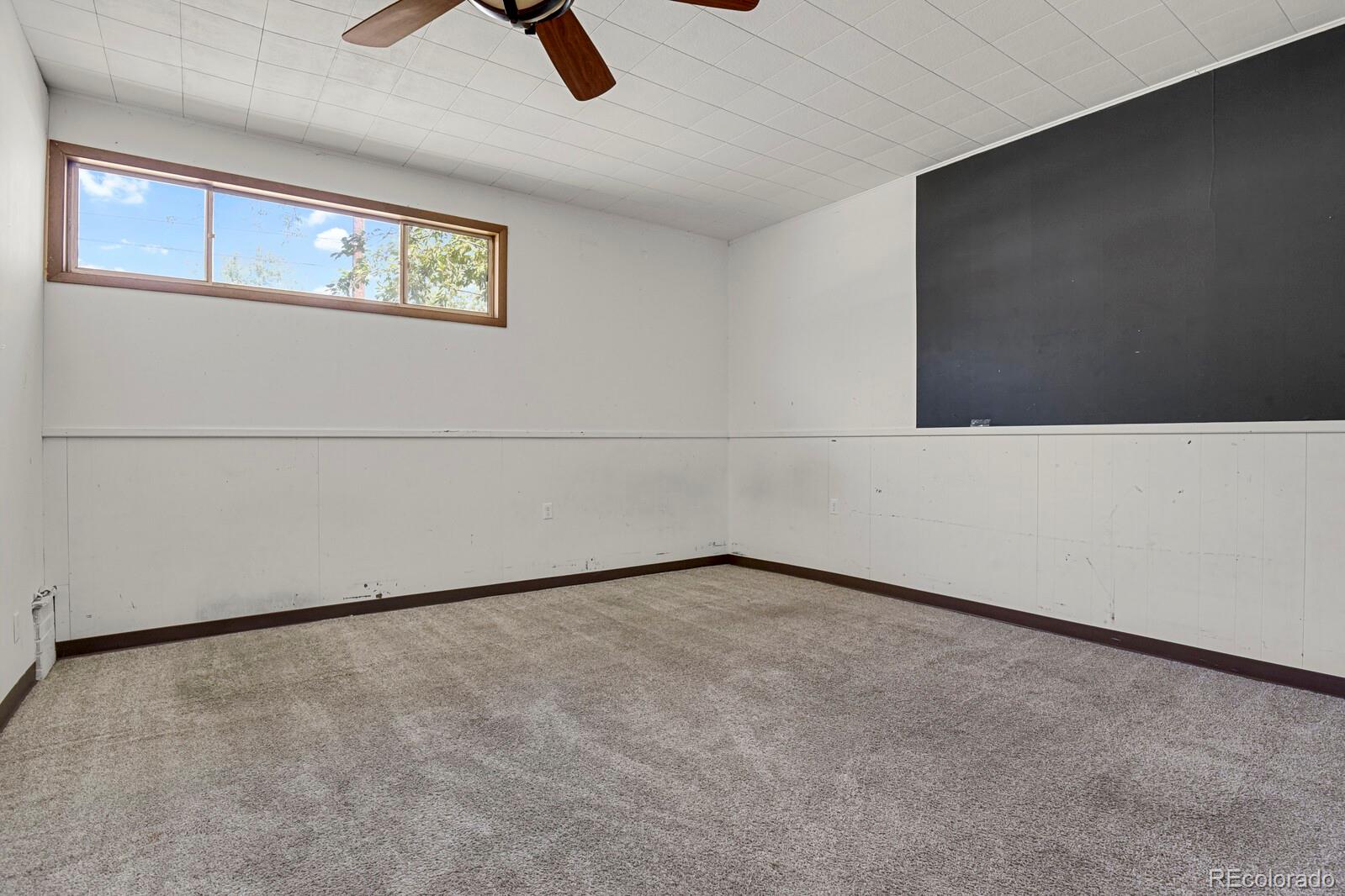 425 West Cheyenne Road Colorado Springs, CO 80906 - Photo 23 of 28 an empty room with windows