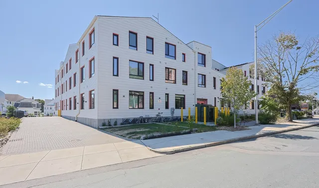a view of a building with a street