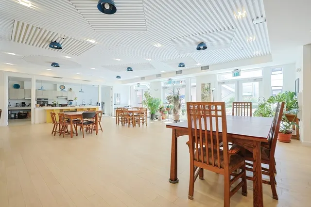 a dining room with furniture and a table