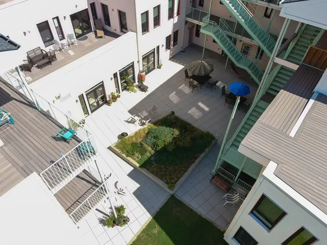 a view of balcony with furniture