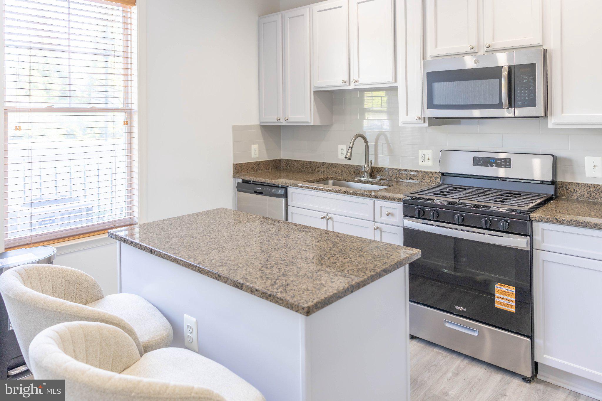 12824 Clarksburg Square Road, Unit 105 Clarksburg, MD 20871 - Photo 37 of 96 Modern kitchen with sleek finishes.