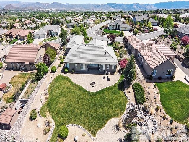 7265 Tempe Court Reno, NV 89511 - Photo 3 of 24 an aerial view of a house with a mountain