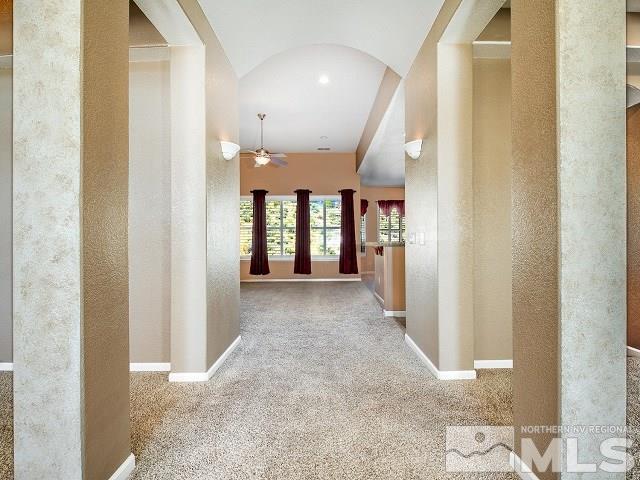 7265 Tempe Court Reno, NV 89511 - Photo 7 of 24 a view of hallway with furniture and a window