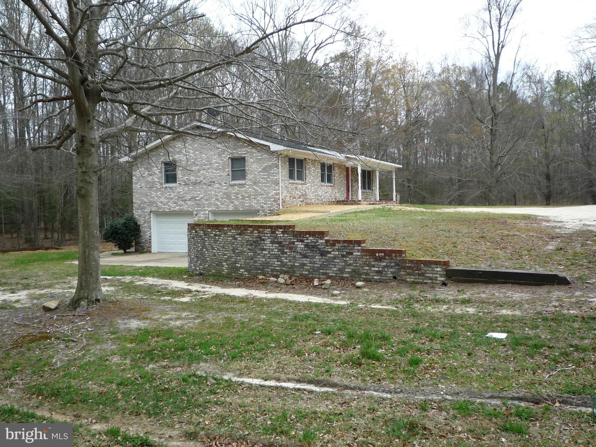 10285 Rte 717 King George, VA 22485 - Photo 3 of 21 a front view of a house with a yard