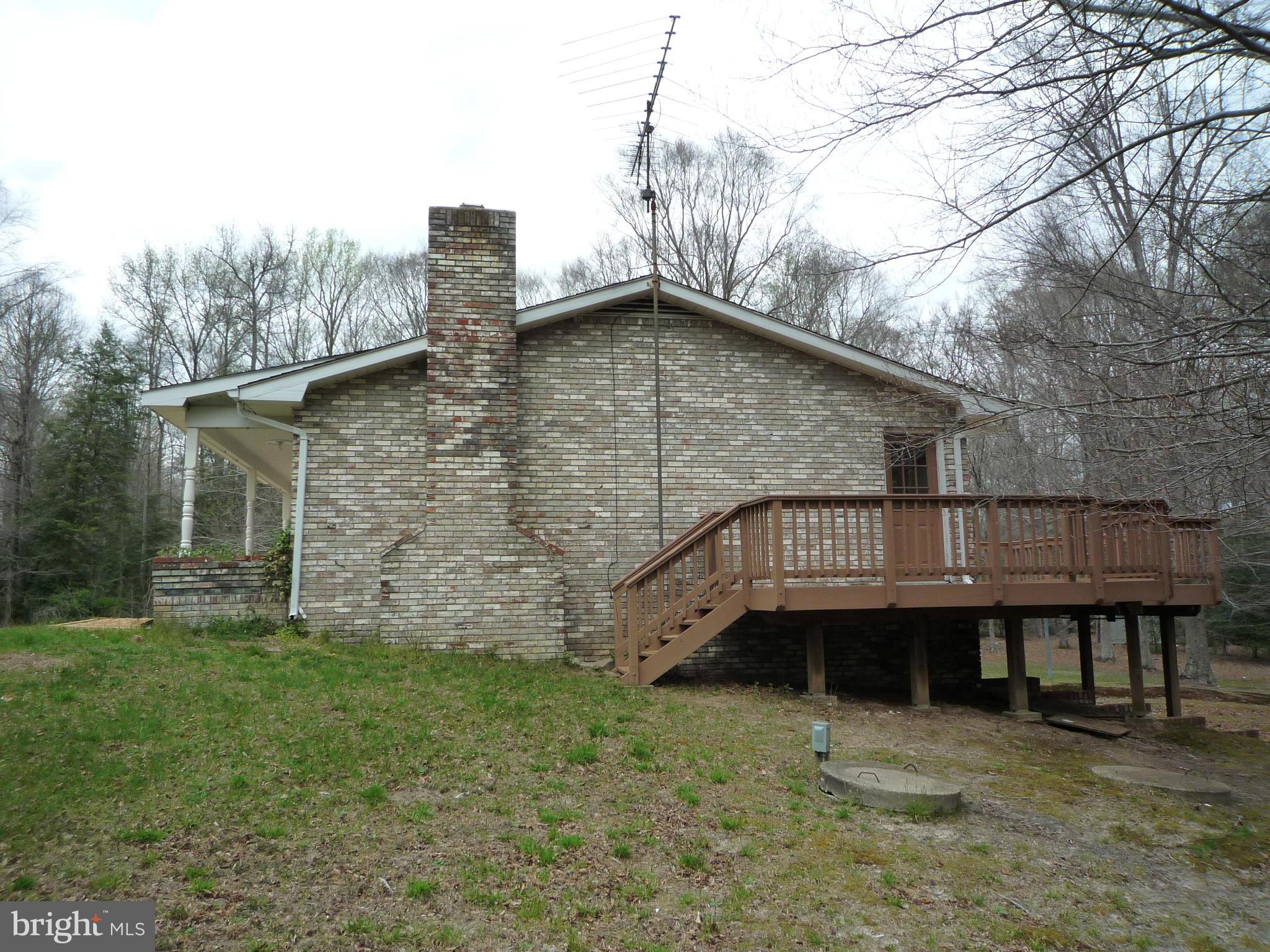 10285 Rte 717 King George, VA 22485 - Photo 8 of 21 a backyard of a house with lots of green space