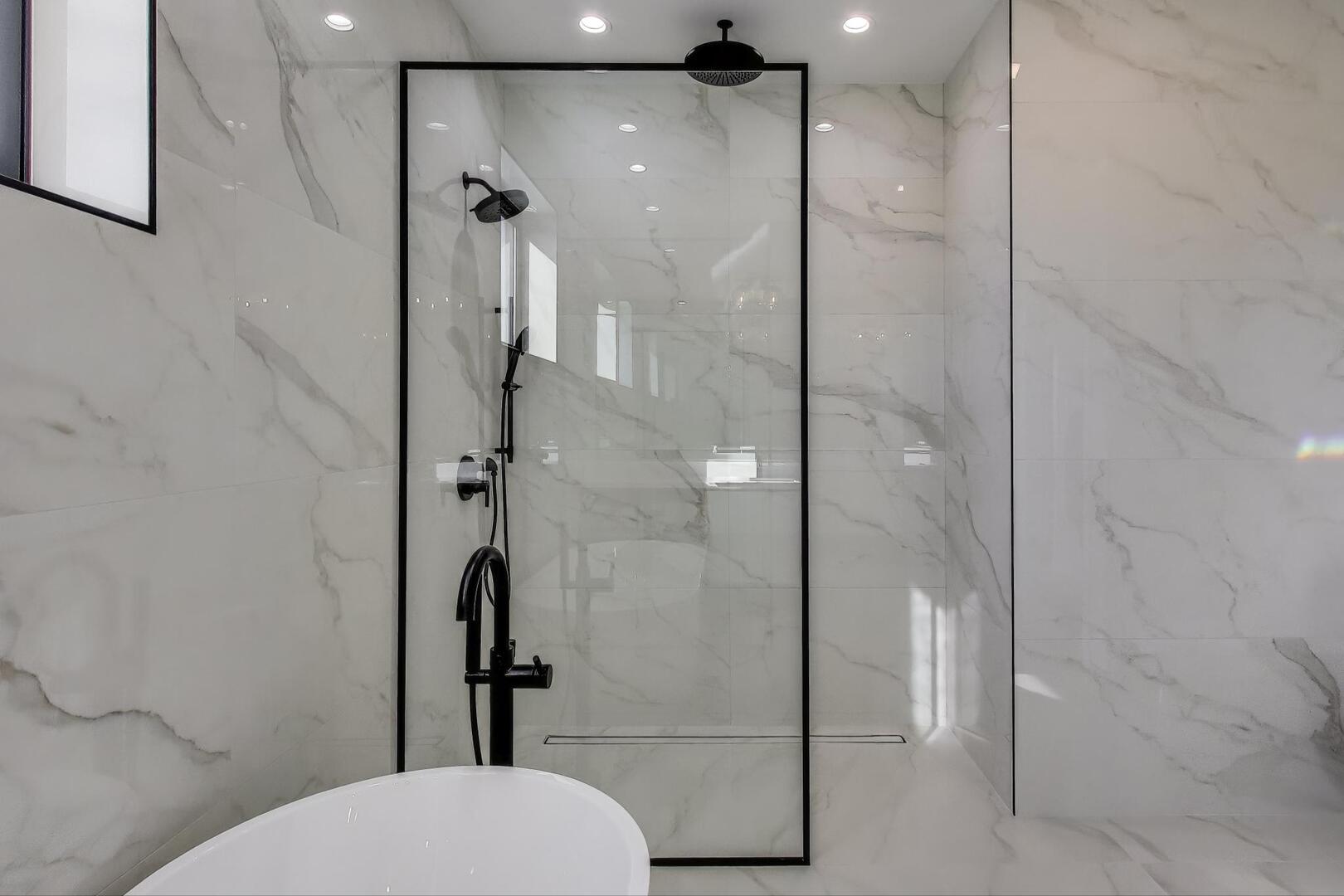 2307 West Foster Avenue, Unit 1 Chicago, IL 60625 - Photo 22 of 34 a bathroom with a shower and toilet