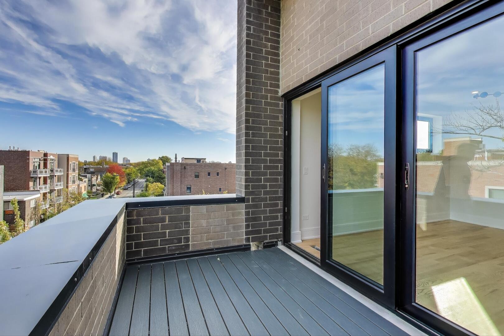2307 West Foster Avenue, Unit 1 Chicago, IL 60625 - Photo 24 of 34 a view of balcony with furniture