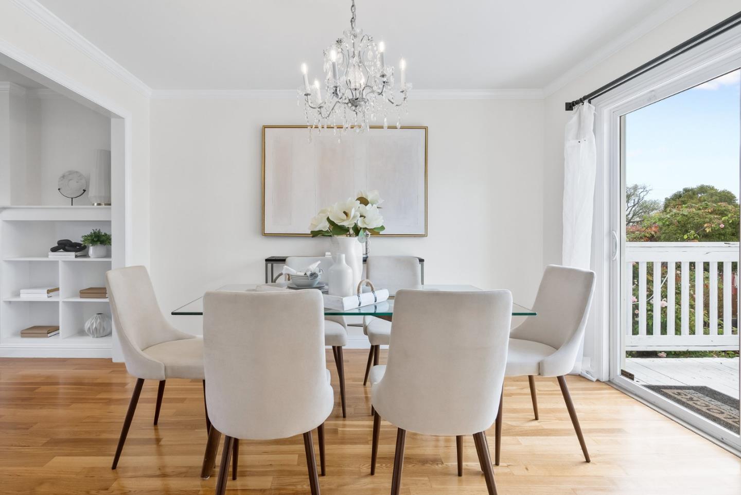 511 Bayview Avenue Millbrae, CA 94030 - Photo 11 of 36 a view of a dining room with furniture window and wooden floor